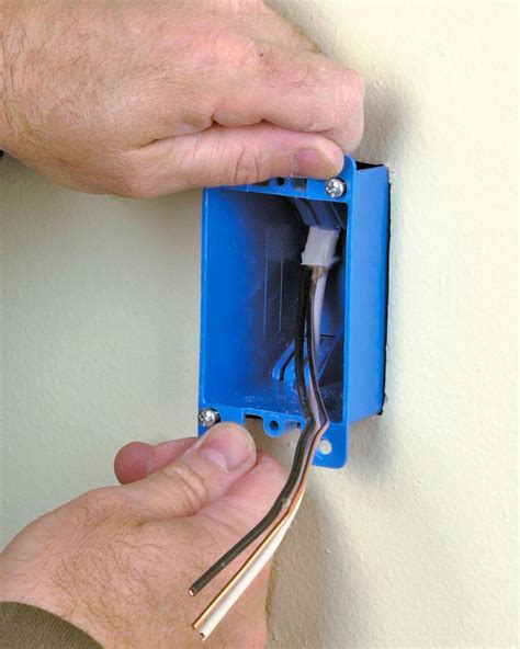 add electrical box to existing wall|installing electrical box on drywall.